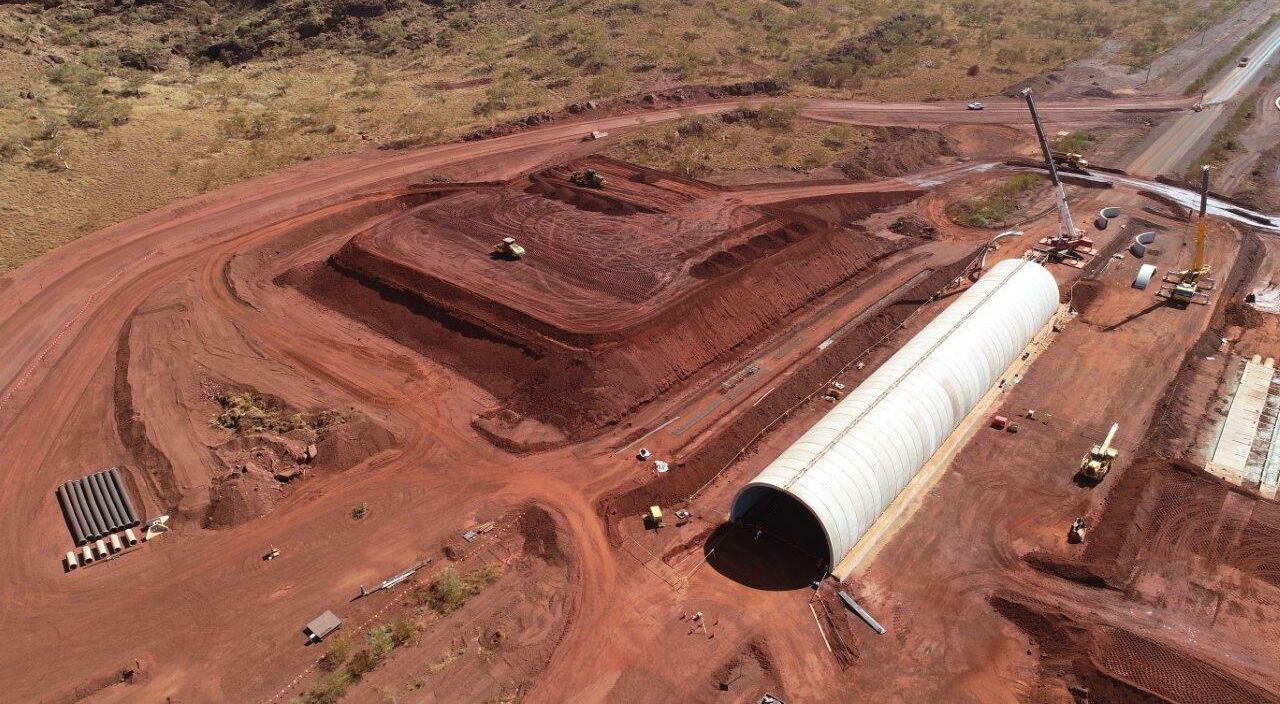 Precast concrete arch solution, TechSpan® by Geoquest pictured on a largescale mine in Western Australia, surrounded by the red earth of Australia's north-west coast.