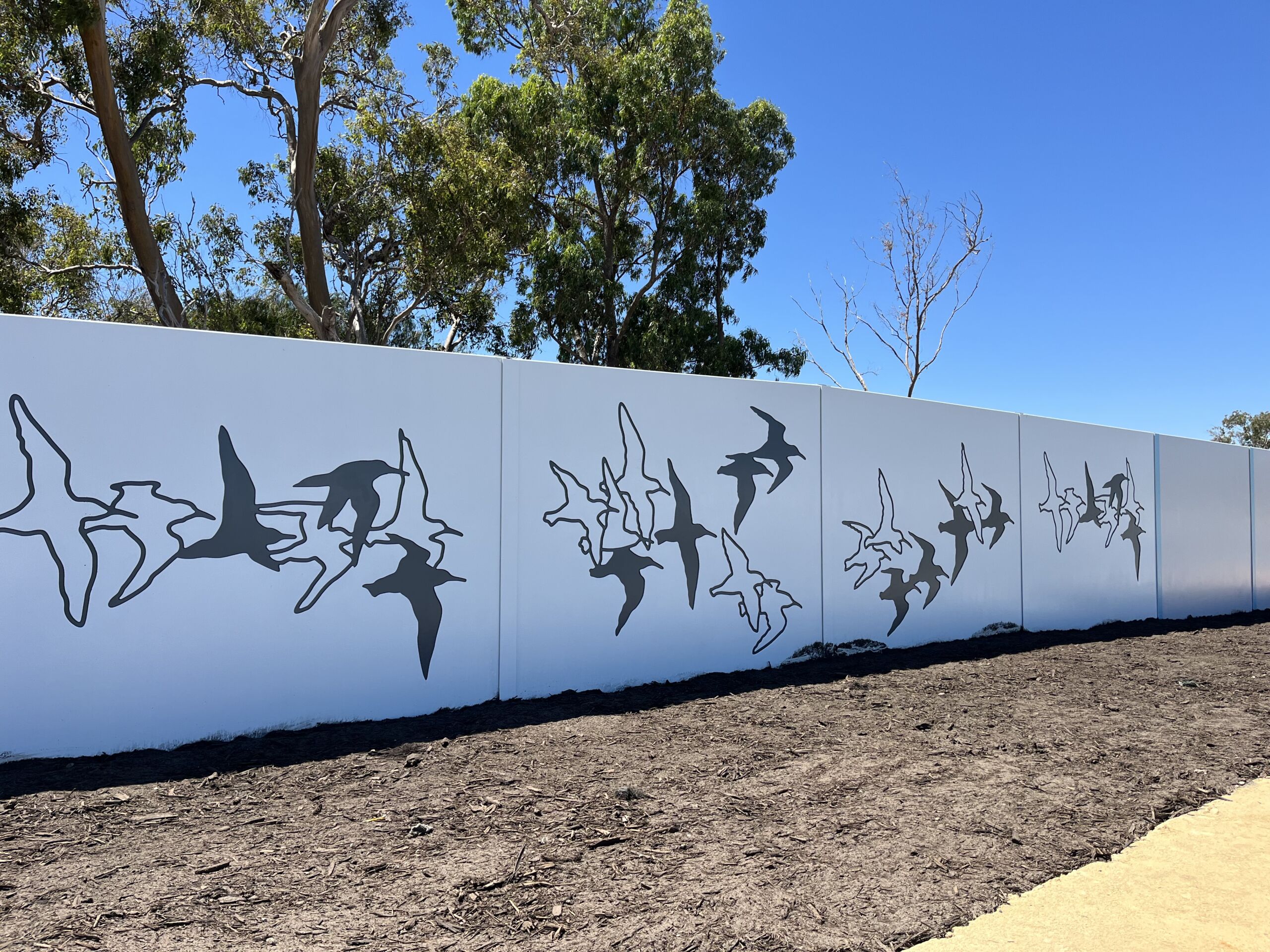 Bespoke decorative precast concrete noise walls with architectural designs, installed in Mandurah, Western Australia.