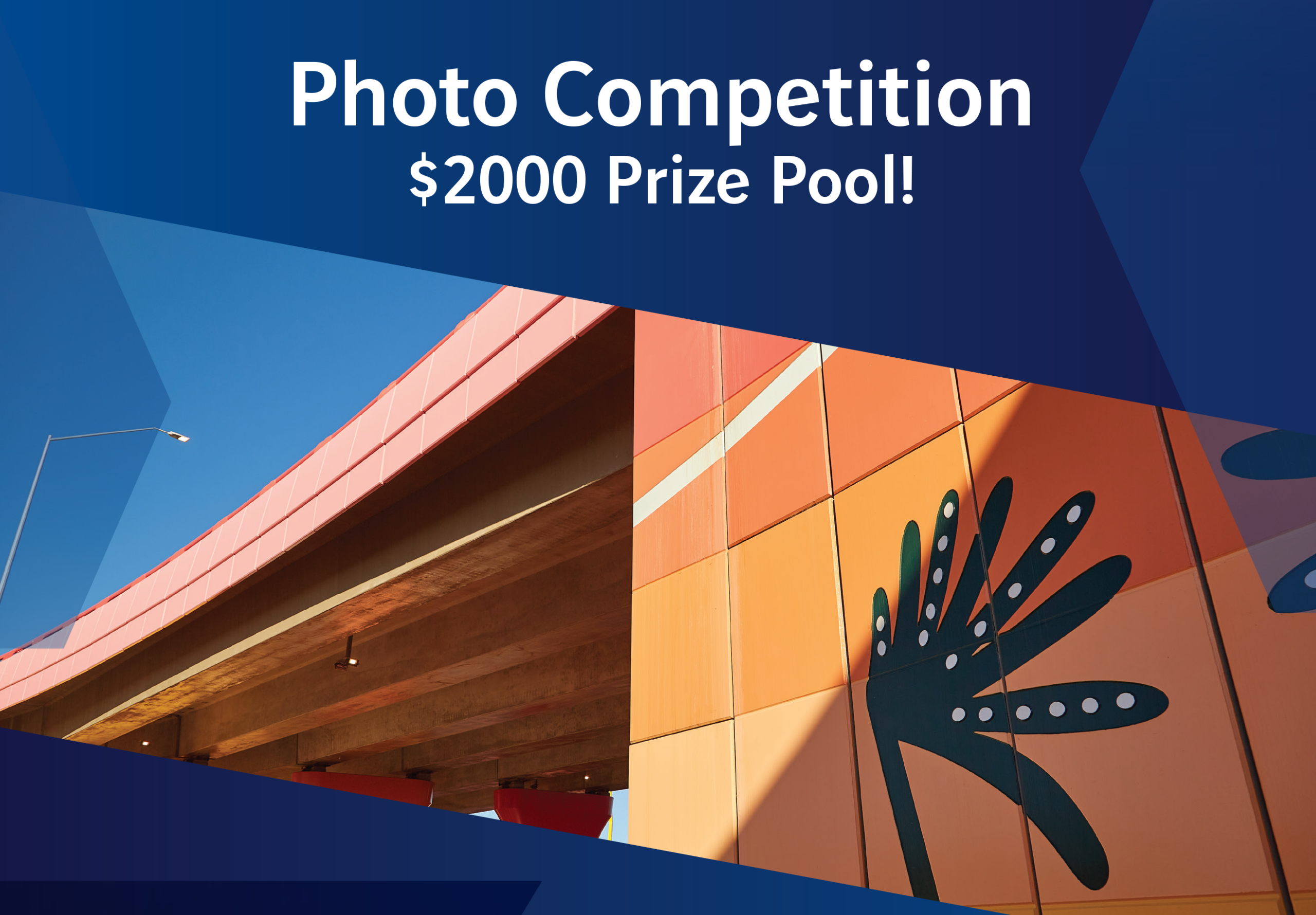 Geoquest Photography Exhibition promotion banner with image of colourful retaining wall