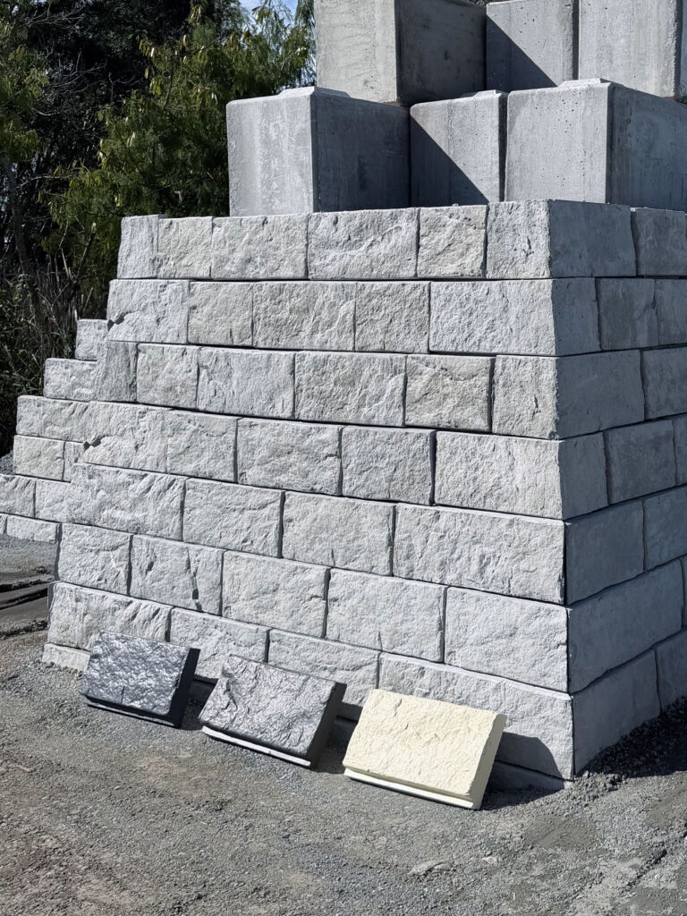 Painted colours TerraStack Modular Retaining Walls TerraStack® Precast Modular Panel Retaining Wall System painted in three different colours